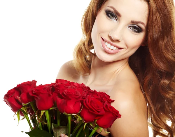 Beautiful female holding red roses bouquet, valentines day. Royalty Free Stock Photos