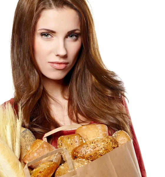 Flicka som håller en påse med mat — Stockfoto