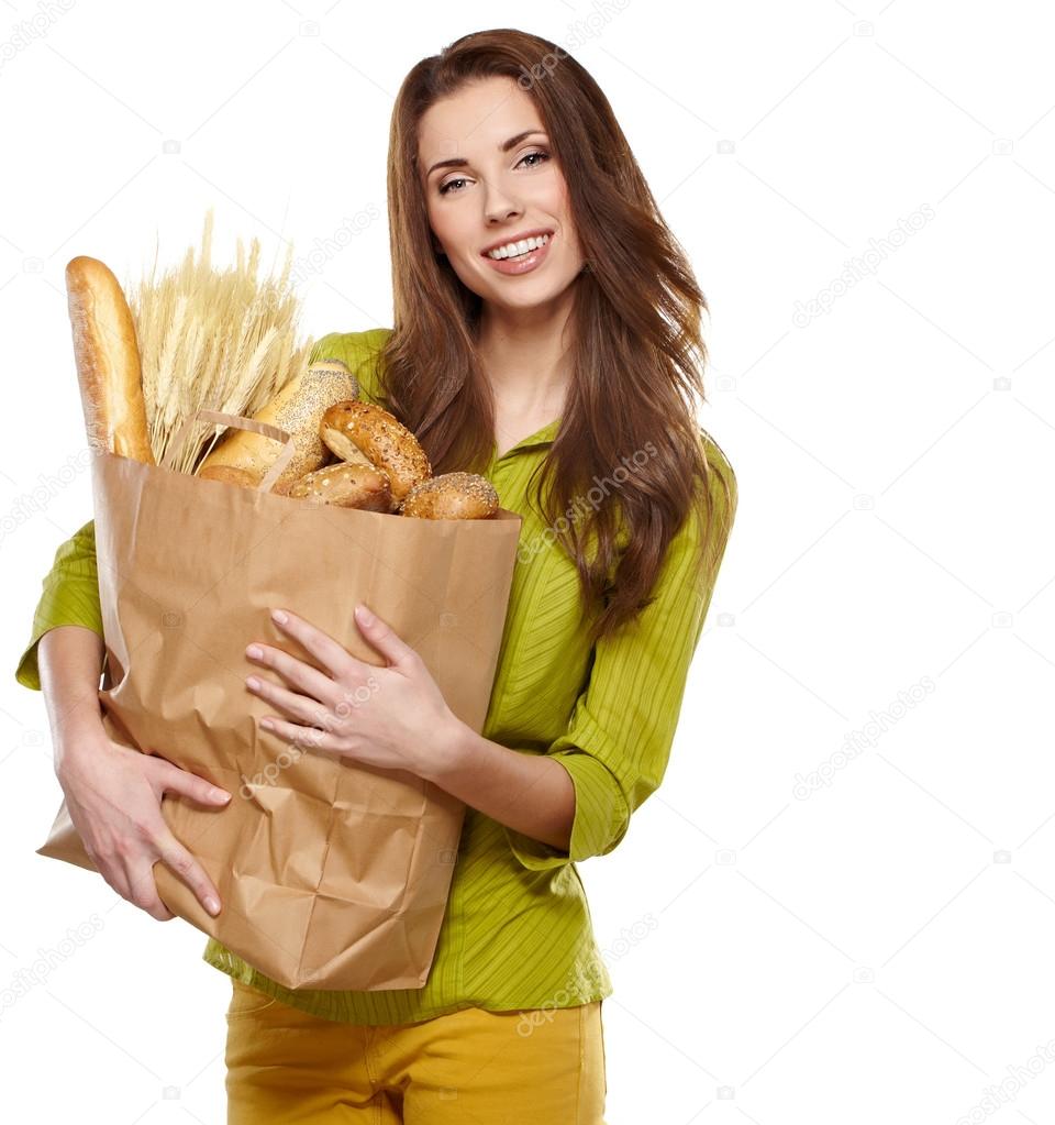 Smiling woman holding a grocery bag — Stock Photo © zoomteam 20756697