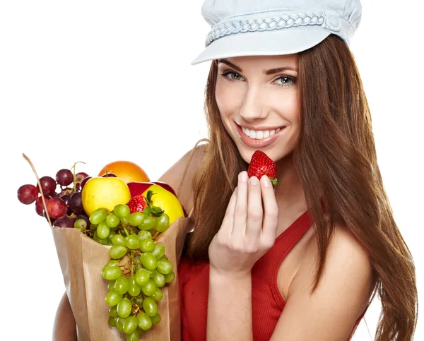 Portrait of happy young female holding a shopping bag full of gr — Stock Photo, Image