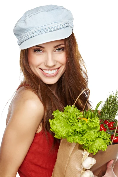 Portrait of happy young female holding a shopping bag full of gr — Stock Photo, Image