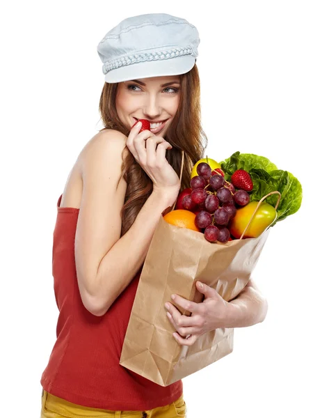 Giovane donna con una borsa della spesa. Isolato su dorso bianco — Foto Stock