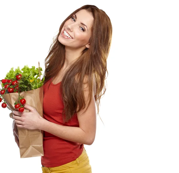 Jonge vrouw met een boodschappentas kruidenier. geïsoleerd op witte backg — Stockfoto