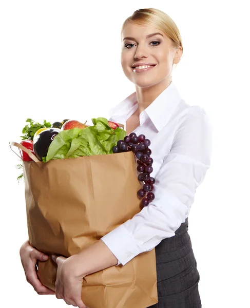 Mujer joven con una bolsa de compras de comestibles —  Fotos de Stock