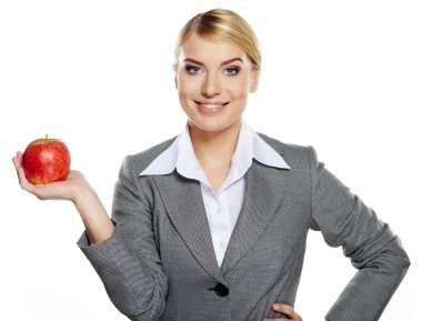 concep iş kadını ile kırmızı elma onun elinde - sağlıklı yeme