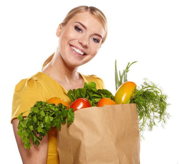 Young woman with a grocery shopping bag