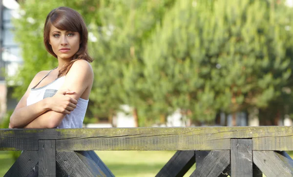 Portrait of a sexy young female smiling in a park - Outdoor — Stock Photo, Image