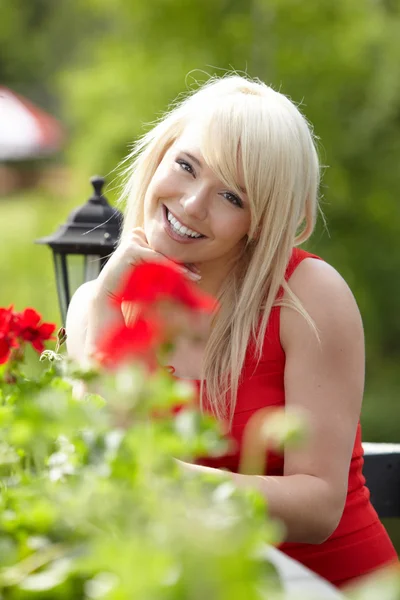 Beautiful sexy young blonde woman in balcony — Stock Photo, Image