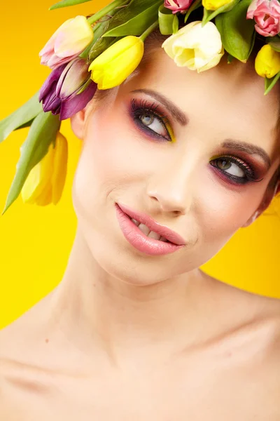 Woman portrait with wreath from flowers on head — Stock Photo, Image