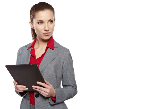 Young attractive business woman uses a mobile tablet computer — Stock Photo, Image