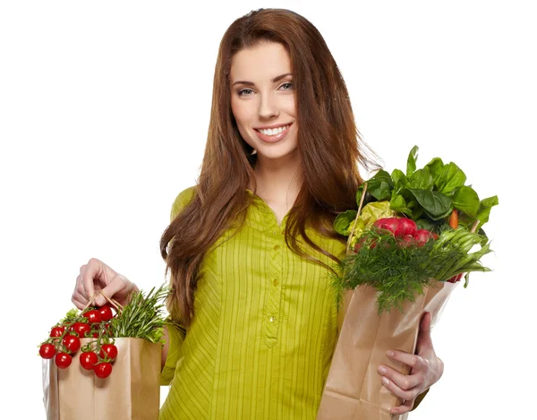 Menina segurando um saco de comida — Fotografia de Stock