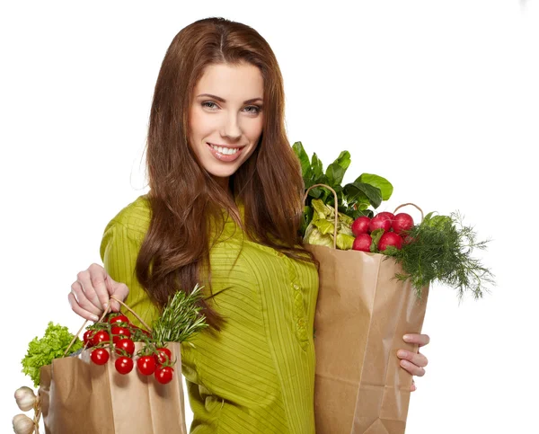 Chica sosteniendo una bolsa de comida — Foto de Stock