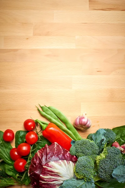 Abstract design background vegetables on a wooden background — Stock Photo, Image