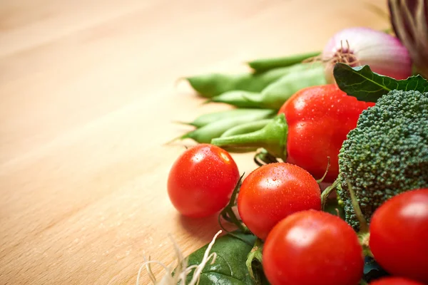 Abstract design background vegetables on a wooden background — Stock Photo, Image