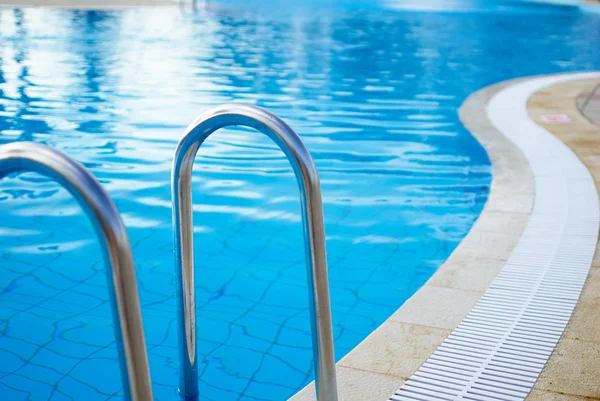 Part of swimming pool with blue water — Stock Photo, Image