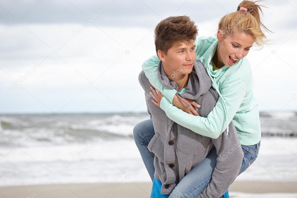 Couple Enjoying Romantic autumn beach