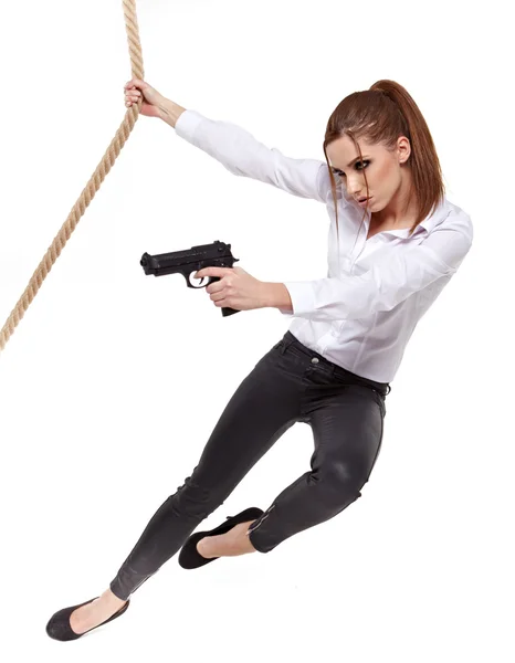 Young beauty woman holding handgun, ready to fight — Stock Photo, Image