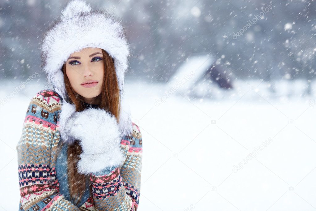 Attractive young woman in wintertime outdoor