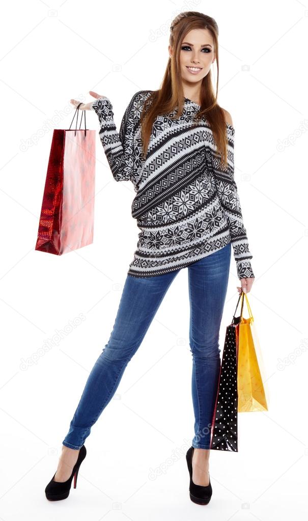 Shopping woman walking and holding bags