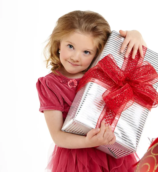 Little girl with christmas gift — Stock Photo, Image