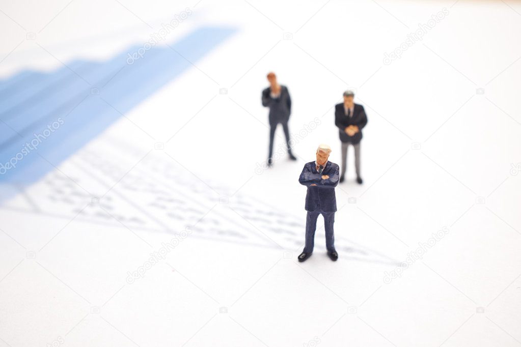 Figures of businessmen