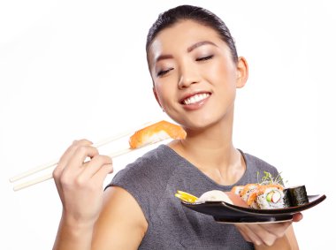 Woman eating sushi clipart