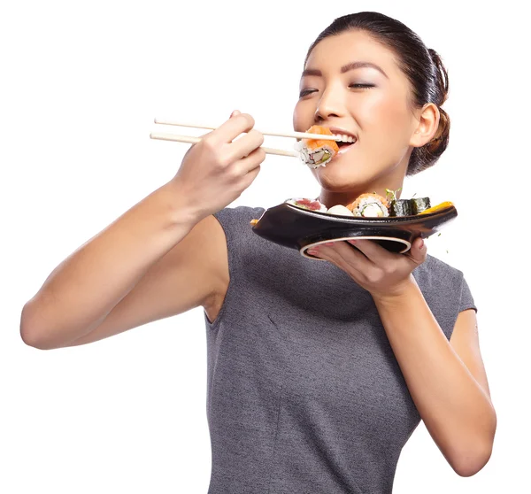ผู้หญิงกินซูชิ — ภาพถ่ายสต็อก