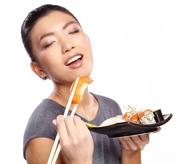 Woman eating sushi — Stock Photo, Image