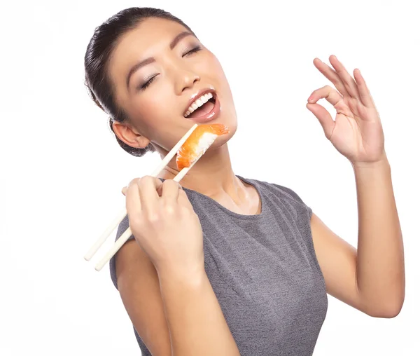 Mujer comiendo sushi —  Fotos de Stock