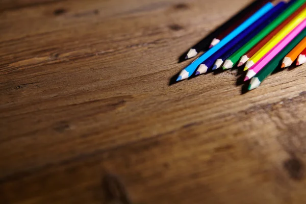 Set of color pencils on old wooden — Stock Photo, Image