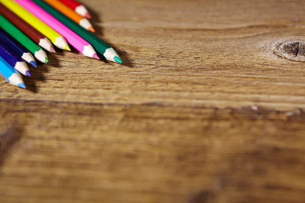 Set of color pencils on old wooden — Stock Photo, Image