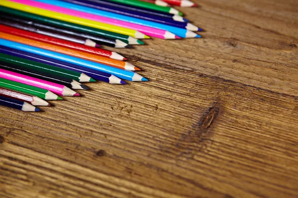 Set of color pencils on old wooden — Stock Photo, Image