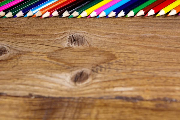 Set of color pencils on old wooden — Stock Photo, Image