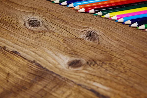 Set of color pencils on old wooden — Stock Photo, Image