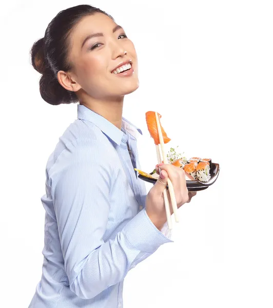 Γυναίκα τρώει σούσι — Φωτογραφία Αρχείου
