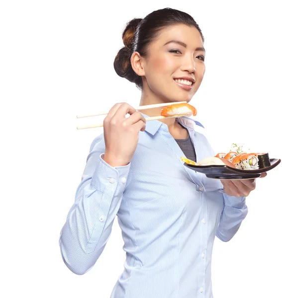 Woman eating sushi — Stock Photo, Image