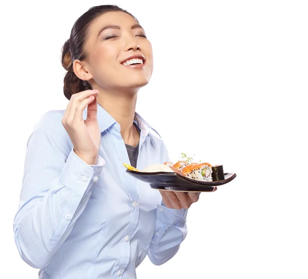 Wanita makan sushi — Stok Foto