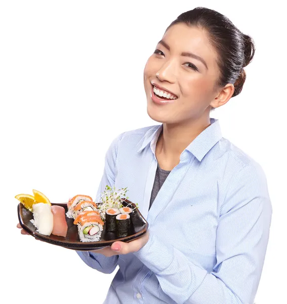 Vrouw eten sushi — Stockfoto