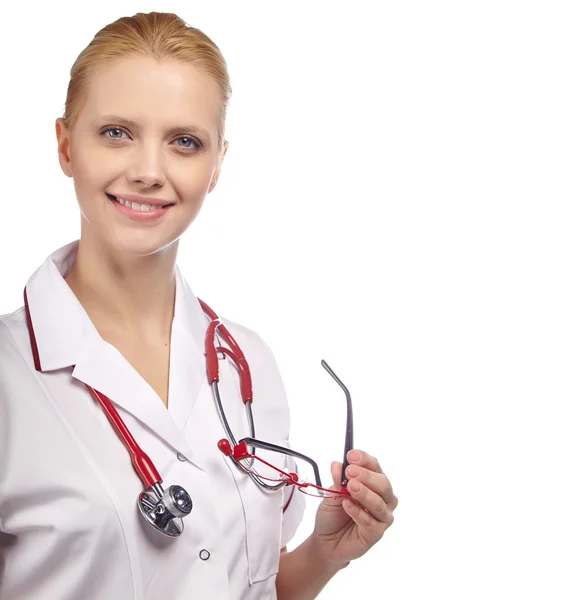 Vrouwelijke arts lachend met glazen — Stockfoto