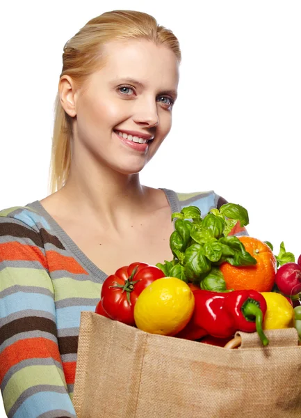 Vrouw met een boodschappentas kruidenier — Stockfoto