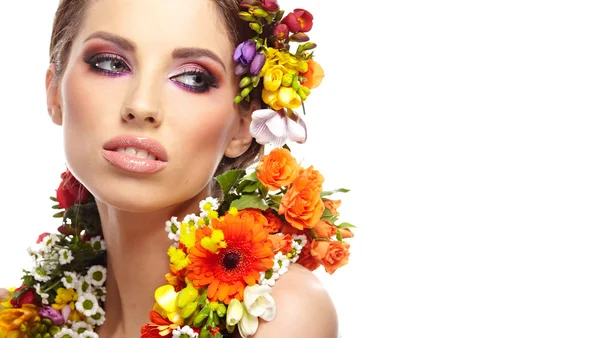 Woman dressed in spring flowers — Stock Photo, Image