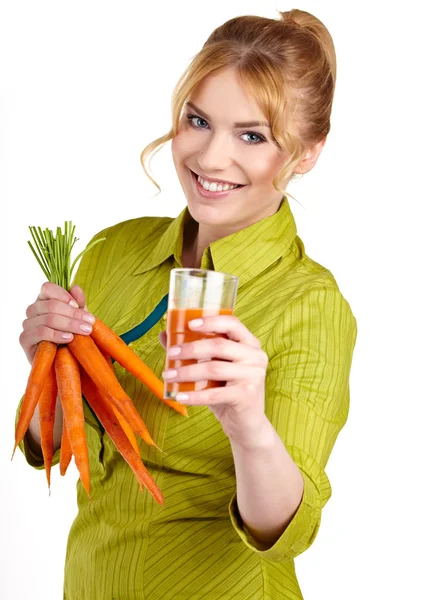 Woman with juice of carrots — Stock Photo, Image