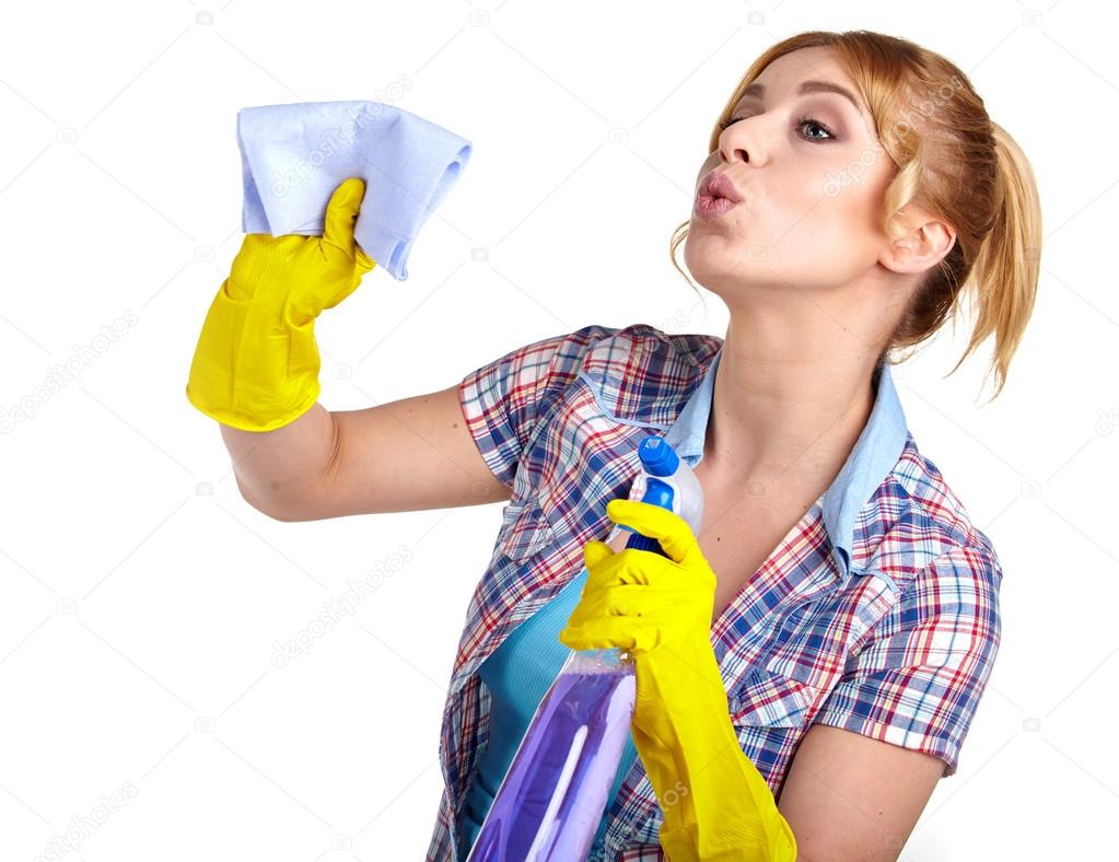 Spring cleaning woman pointing cleaning spray bottle.