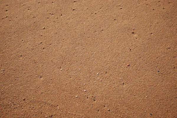 Текстура песка для фона — стоковое фото
