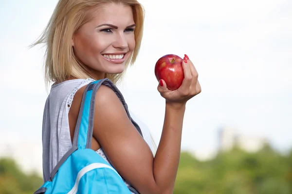 Beautiful tourist with a backpack — Stock Photo, Image