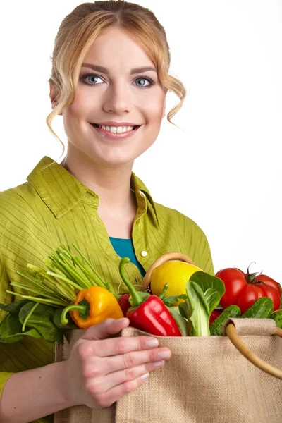 Vrouw met winkelen zakhoogtepunt van boodschappen — Stockfoto