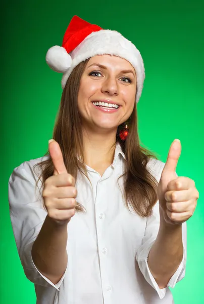 Χαρούμενο κορίτσι σε ένα καπέλο Χριστούγεννα — Φωτογραφία Αρχείου
