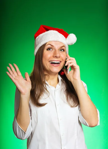 Cheerful girl in a Christmas hat — Stock Photo, Image