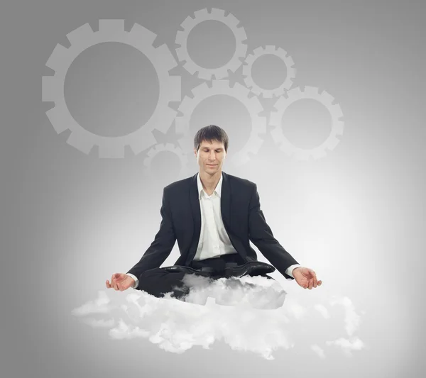 Businessman on a cloud — Stock Photo, Image