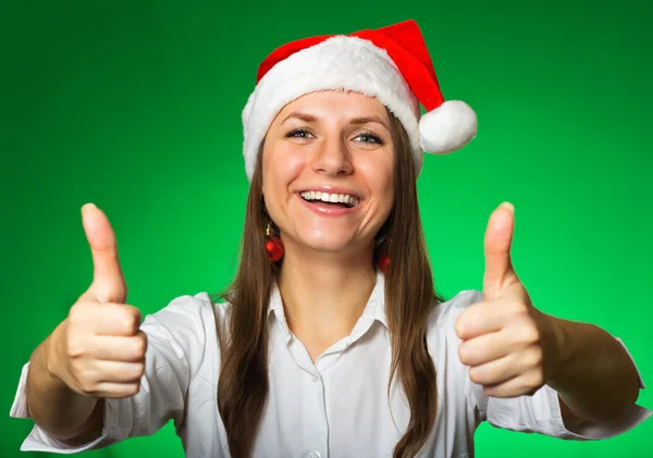 Cheerful girl in a Christmas hat — Stock Photo, Image